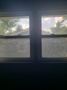 Windows with the bottom pane covered in window film.